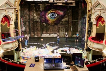Asolo Rep crew members preparing the stage for a performance.
