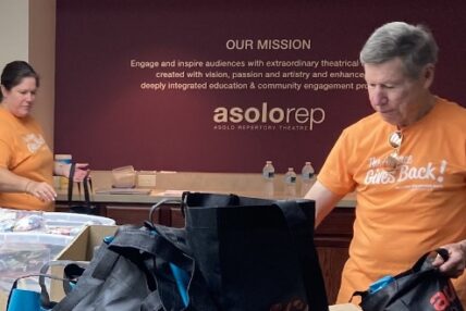 Two volunteers working at Asolo Rep.