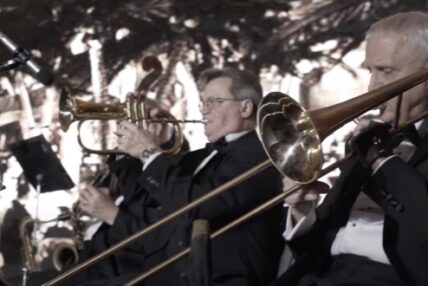 Two men playing brass instruments on stage at Asolo Rep's 2019 Annual Gala.