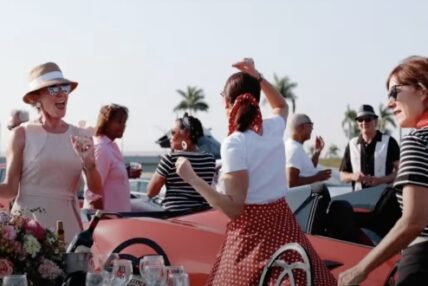 Women dancing in front of a car at Asolo Reps 2021 Annual Gala.